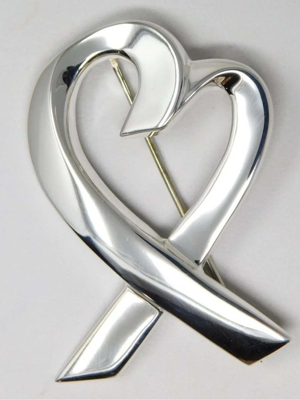 Tiffany & Co. Paloma Picasso Loving Heart Brooch in polished sterling silver